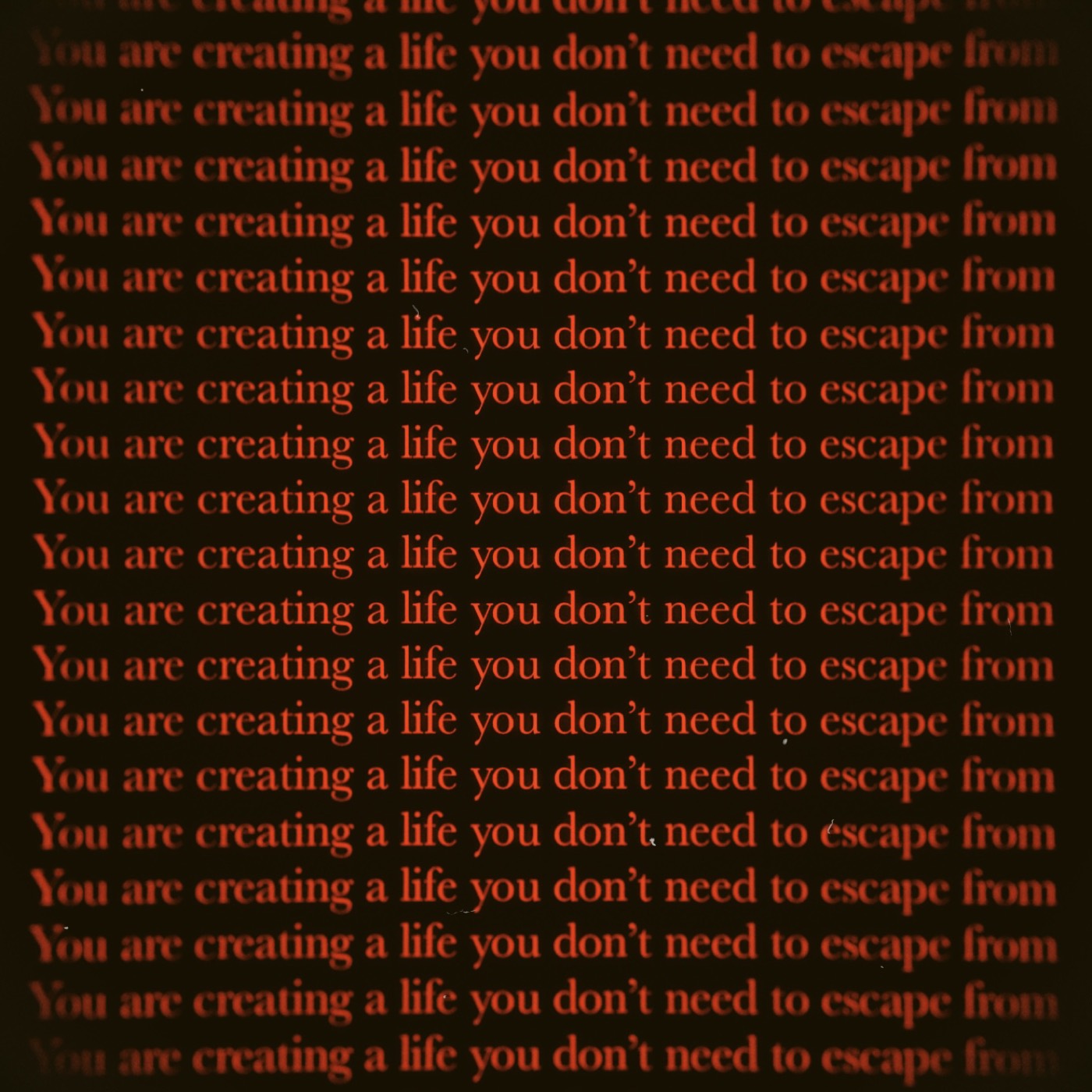 Frase tipografada em vermelho